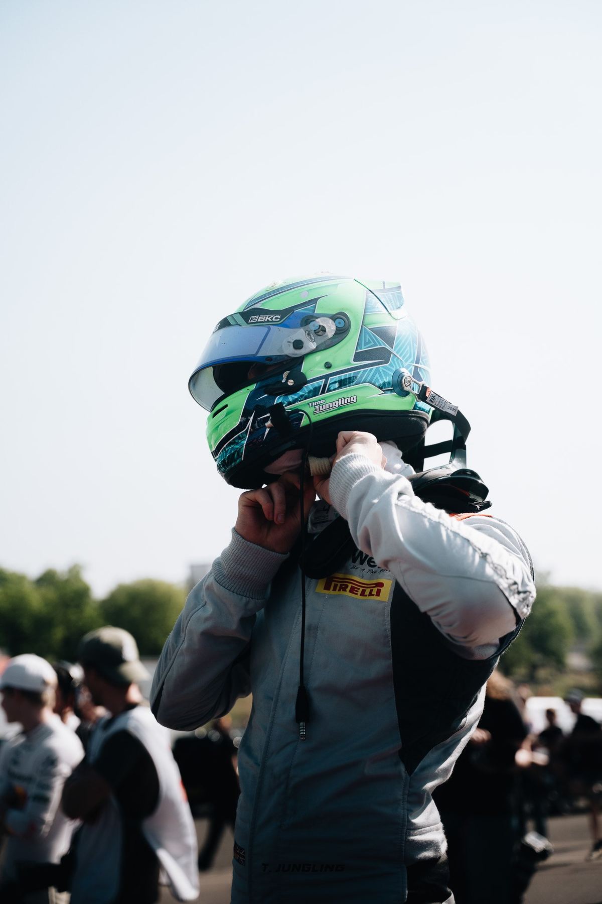 Timo Jüngling putting on his helmet on the grid